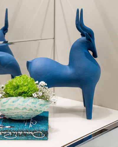 Large gazelle in blue